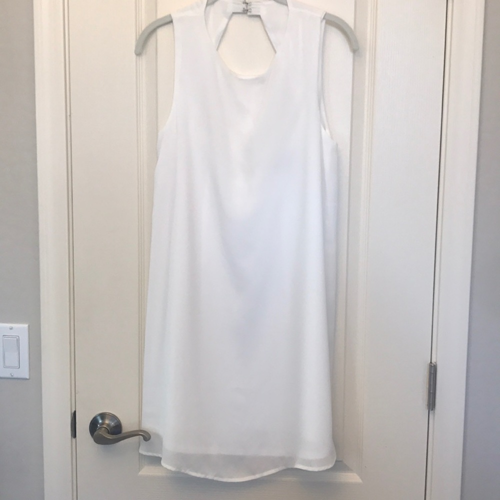 White flow dress with key hole back
